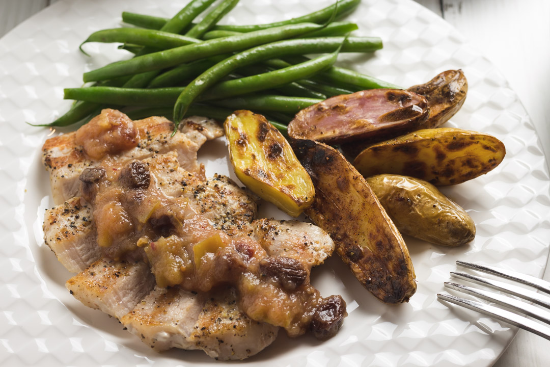 Sweet and spicy apple chutney on pork chops with green beans and potatoes. 
