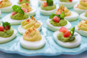 Deviled Eggs two ways... standard and guacamole.
