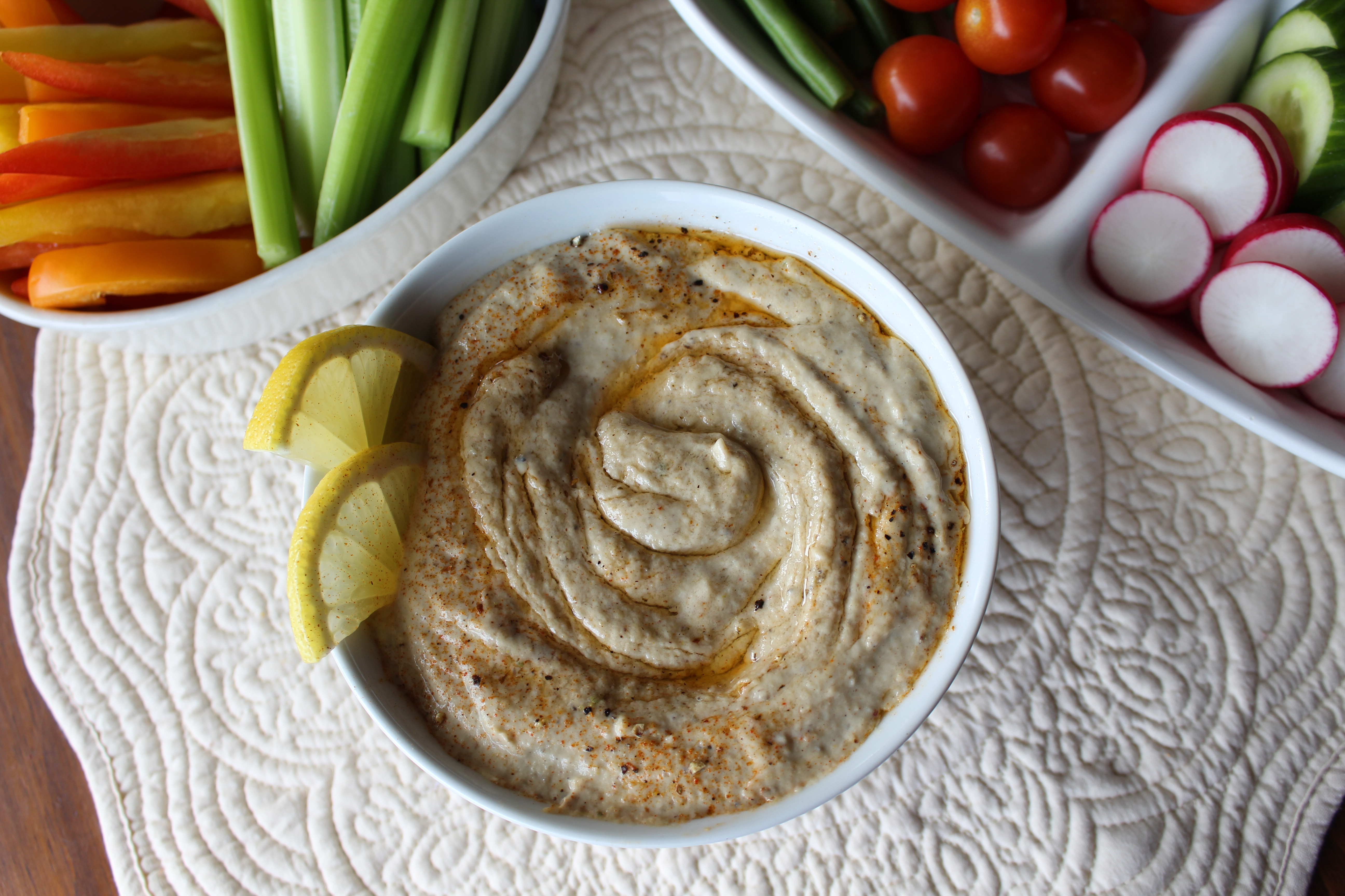 Overhead view of Baba Ganoush (a Whole30) hummus in a bowl.