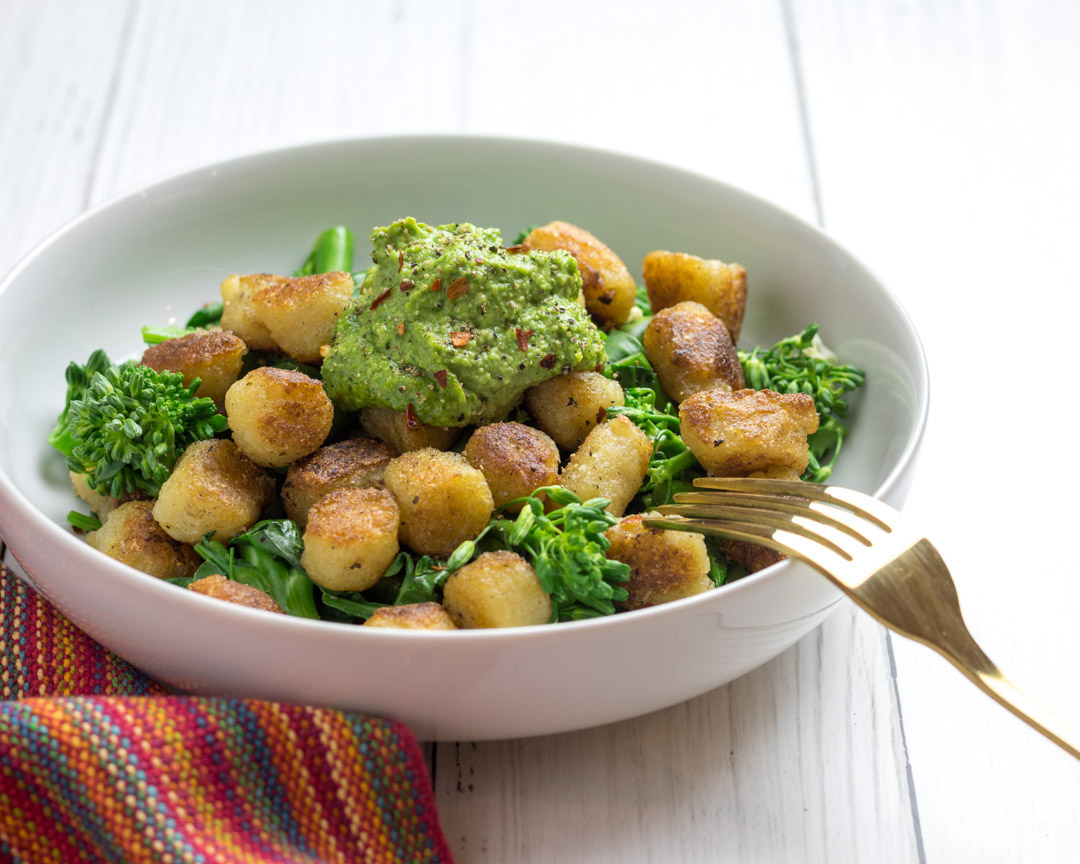 Cauliflower gnocchi with pesto in a bowl