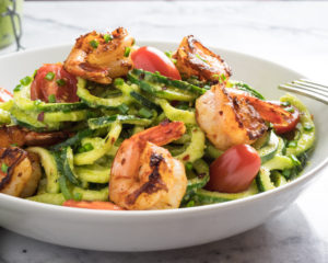 Pesto Zucchini Noodles with Cajun Spiced Shrimp ready to eat