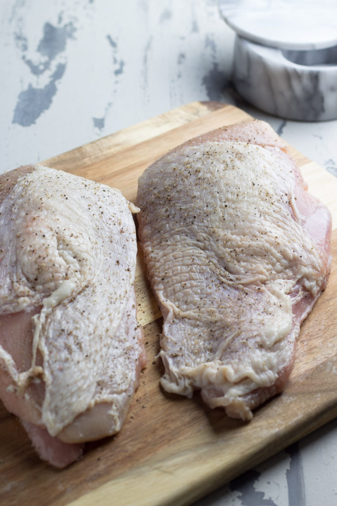 Raw Turkey Breasts with salt and pepper