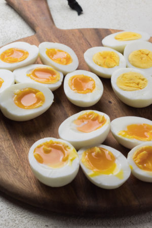 Soft and hard boiled eggs cut in half