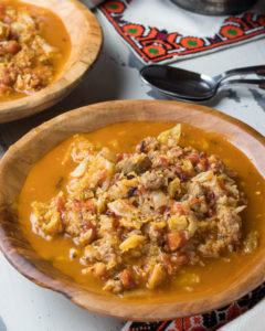 Instant Pot Cabbage Stew in a wooden bowl on a table